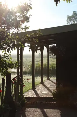 a pergola with a view of a field at Bed and Stay Amsterdam in Amsterdam
