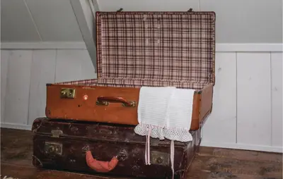 a stack of suitcases with a towel on top at De Bedstee in Opperdoes