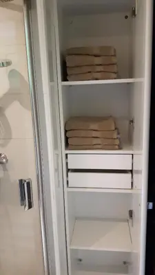 a towel rack in a bathroom with towels at Holiday Home Canal View in Alkmaar