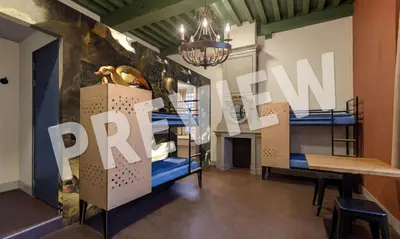 a room with bunk beds and a sign that reads peruvian at Stayokay Hostel Heemskerk - fully renovated April 2026 in Heemskerk