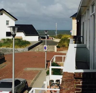 a balcony of a house with a view of the ocean at NEW Appartment Zandvoort! in Zandvoort