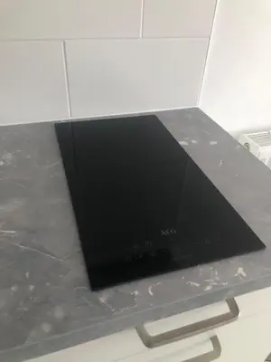 a flat screen tv sitting on top of a counter at Casa Belle Dune in Zandvoort