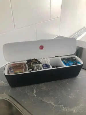 an open drawer on the counter of an airplane at Casa Belle Dune in Zandvoort