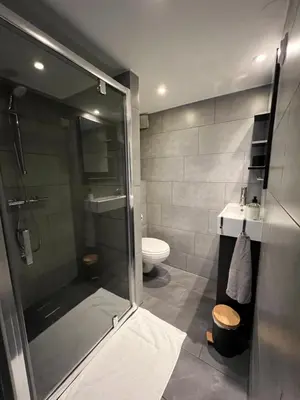 a bathroom with a shower and a toilet at 7B&B in Amsterdam
