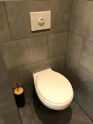 a bathroom with a white toilet in a stall at 7B&B in Amsterdam