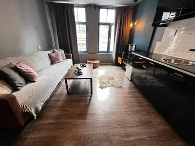 a living room with a couch and a table at 7B&B in Amsterdam