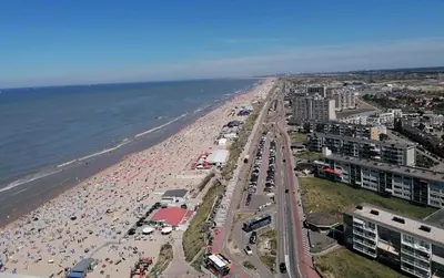 an aerial view of a beach with a lot of people at Evy's place in Zandvoort
