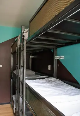 a couple of bunk beds in a room at Amsterdam Hostel Leidseplein in Amsterdam
