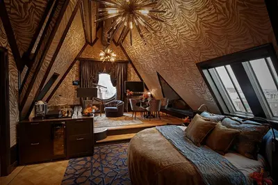 a bedroom with a large bed in a room at Hotel TwentySeven - Small Luxury Hotels of the World in Amsterdam