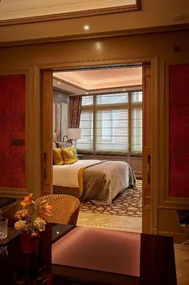a bedroom with a bed and a window at Hotel TwentySeven - Small Luxury Hotels of the World in Amsterdam