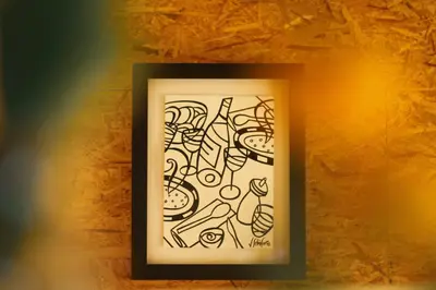 a drawing in a picture frame on a wall at Tulpenhuys in Hoogmaden