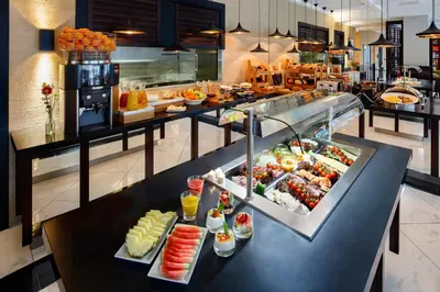 a buffet line with many different types of food at Boutique Hotel Notting Hill in Amsterdam