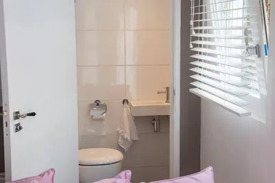 a bathroom with a toilet and a sink at B&B Bike Studio Amsterdam in Amsterdam
