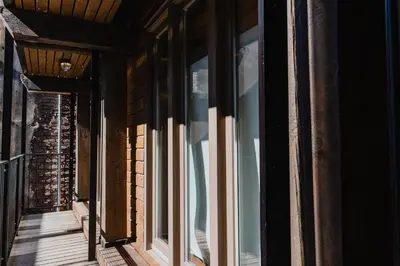 a hallway with windows on a building at Hotel van de Vijsel in Amsterdam