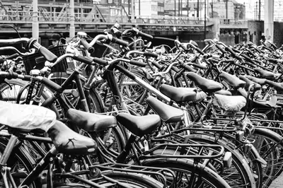 a large group of bikes parked in a row at Quentin Zoo Hotel in Amsterdam