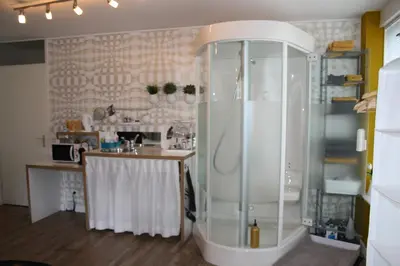 a bathroom with a shower and a sink at The Water Studio in Amsterdam