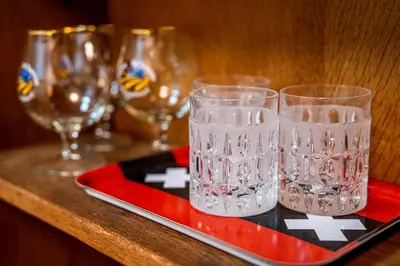 a group of glasses sitting on a table at Stylish Private Studio Close to City in Amsterdam