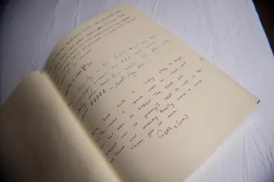 a book with handwriting on the pages of it at City Break Amsterdam in Amsterdam