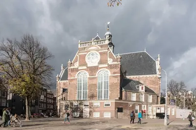 a building with a clock tower on top of it at City Heart Station Amsterdam in Amsterdam