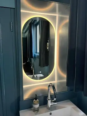 a bathroom with a sink and a mirror at SeventyFive in Amsterdam