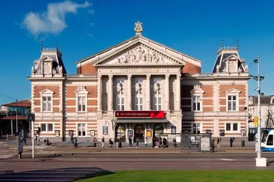 a large brick building on a city street at Luxury Prinsengracht Canal House Jordan Area in Amsterdam