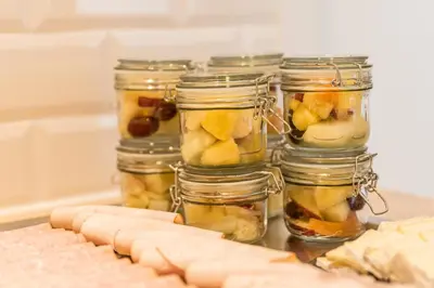 a group of jars filled with fruit and vegetables at Holiday Inn - the niu, Dairy Haarlem in Haarlem