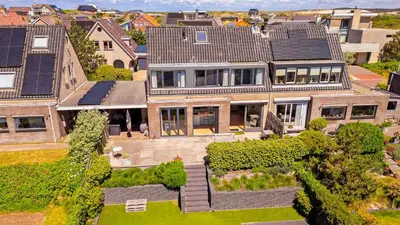 an aerial view of a house with a yard at Goudkust 3 'At Sea' in Bergen