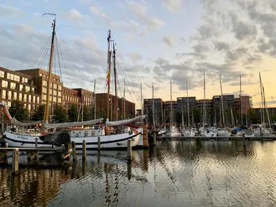 a group of boats docked at a dock in a harbor at Waterfront Studio in Amsterdam