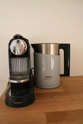 a blender sitting on a table next to a coffee pot at Waterfront Studio in Amsterdam