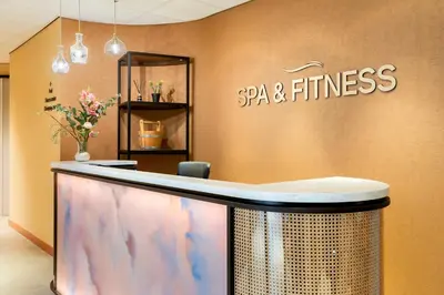 a spa and fitness office with a fish tank at Corendon Urban Amsterdam Schiphol Airport Hotel in Badhoevedorp