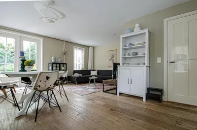 a living room with a table and a couch at Minime in Bergen