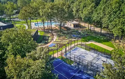 an overhead view of a park with tennis courts at Aquacabin in Aalsmeer