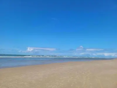 a sandy beach with the ocean in the background at Holiday Home Bergen aan Zee near Beach in Bergen aan Zee