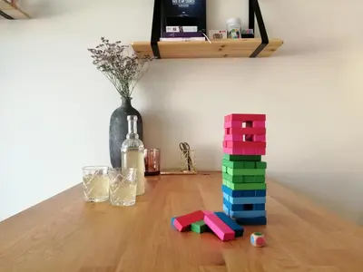 a wooden table with a bunch of legos on it at Zandvoort at Home I Free parking & Airco in Zandvoort