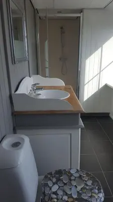 a bathroom with a sink and a toilet at B&B Beemsterlust in Westbeemster