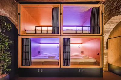 two bunk beds in a building with a room at Bunk Hotel Amsterdam in Amsterdam
