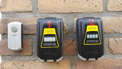 a brick wall with two electric meters on it at Guesthouse Zandvoort in Zandvoort