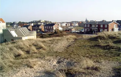 a group of houses on top of a hill at Huisje Zand En Water in Egmond aan Zee