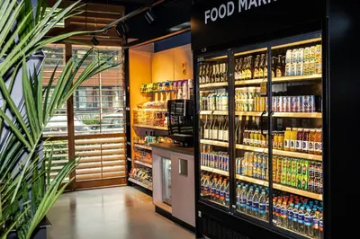 a food market with a large selection of drinks at Cityden Stadshart in Amstelveen