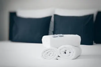 two rolls of toilet paper sitting on a table at Canal House Inn in Amsterdam
