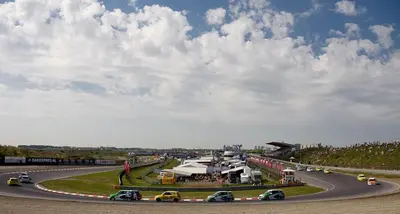 a group of cars driving on a race track at Amsterdam Beach Apartment in Zandvoort