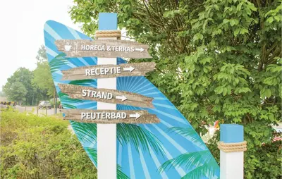 a street sign with many signs on it at Markermeerzicht in Bovenkarspel
