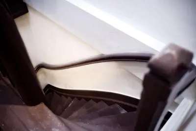 an escalator in a train with a stair case at Cozy Pijp Apartment Amsterdam in Amsterdam