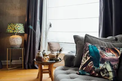 a living room with a couch and a table at Hotel ML in Haarlem