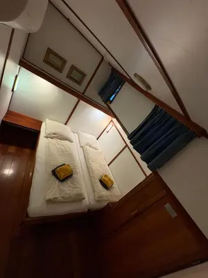 an overhead view of a small room with two beds at Hotelboot Zwaan in Amsterdam