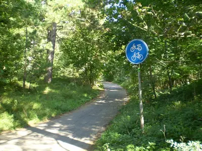 a blue sign on the side of a road at Noordwijk Holiday Rentals in Noordwijk