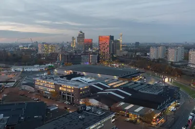 an overhead view of a large city with buildings at Postillion Hotel Amsterdam in Amsterdam