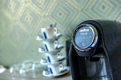 a close up of a toaster with a candle holder at Hotel Atlantis Amsterdam in Amsterdam