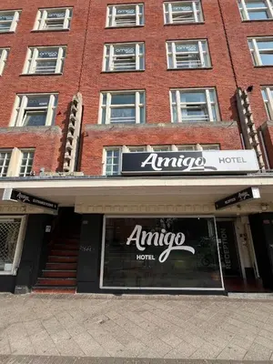 an amoco store in front of a brick building at Amigo Budget Hotel in Amsterdam