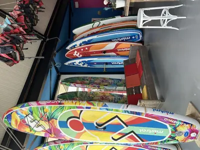 a group of surfboards lined up in a row at Holiday Home Assum by Interhome in Uitgeest